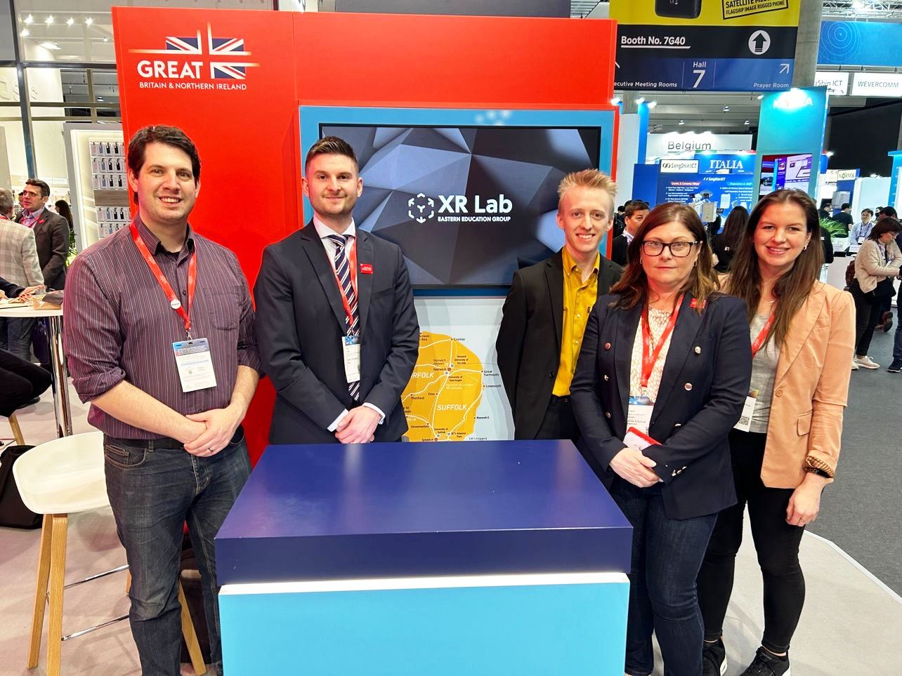 Tom Lloyd (second left), Jake Mills third left) with delegates at the Mobile World Conference in Barcelona